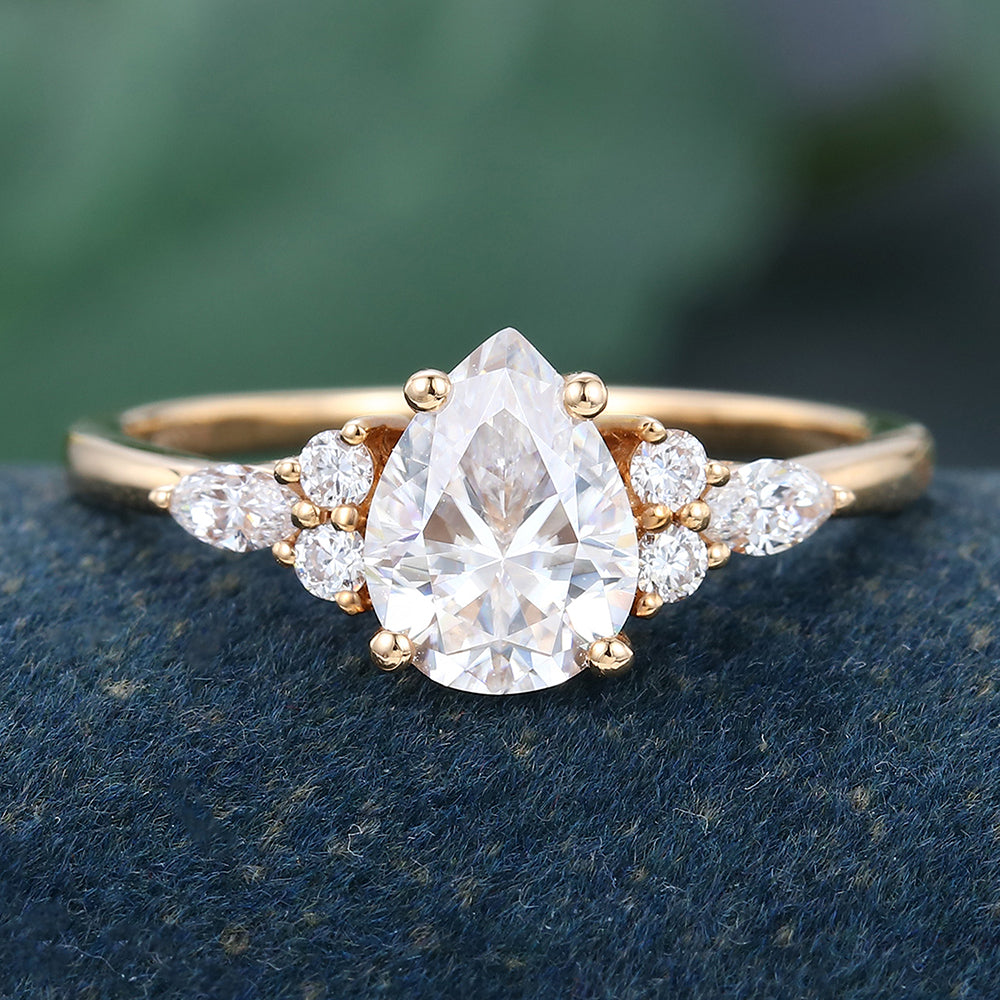 Rose Gold Pear Shaped Moissanite Cluster Engagement Ring