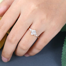 Rose Gold Pear Shaped Moissanite Cluster Engagement Ring
