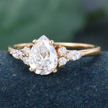Rose Gold Pear Shaped Moissanite Cluster Engagement Ring