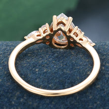 Rose Gold Pear Shaped Moissanite Cluster Engagement Ring