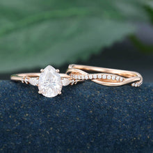 Rose Gold Pear Shaped Moissanite Unique Engagement Ring Set